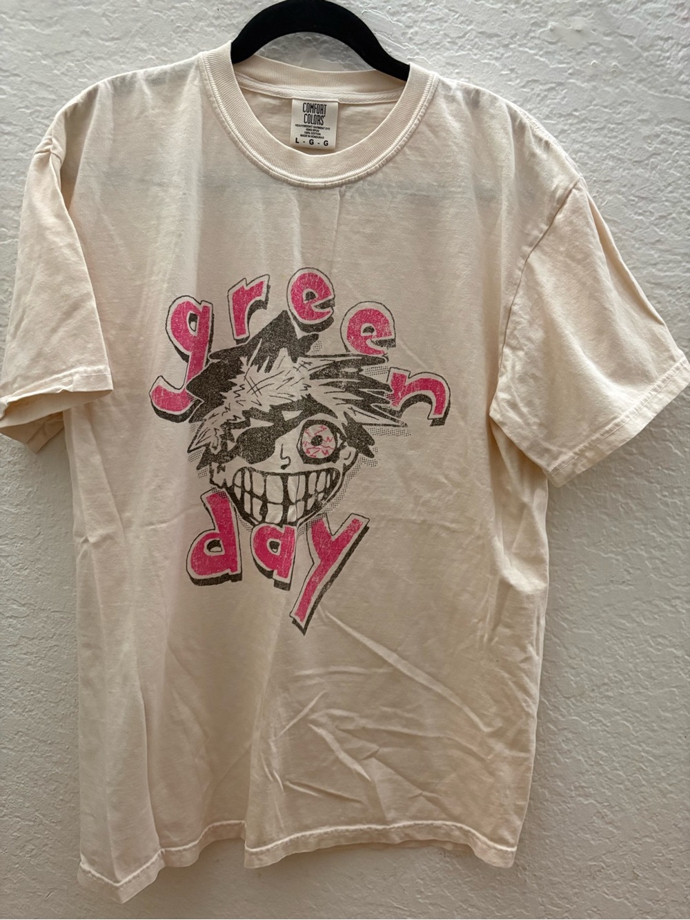 Comfort Colors Green Day Graphic Tee from AlterEgo 2026- Cream with Pink Print